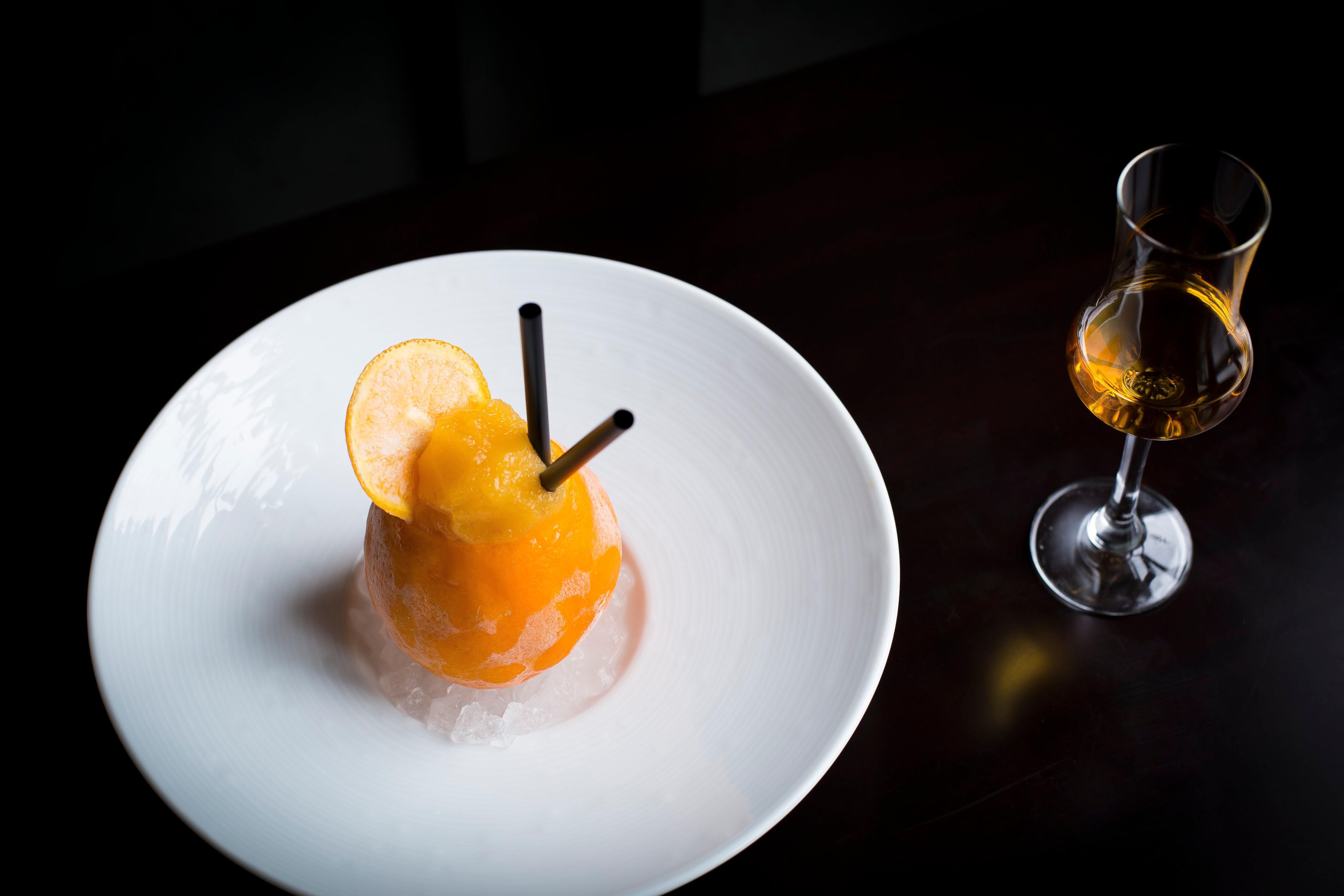 Intercontinental Bordeaux Le Grand Hotel By Ihg Esterno foto A glass of orange sorbet